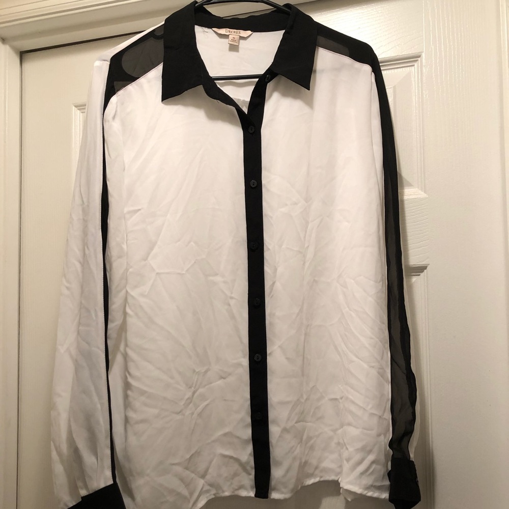 Black and white button down blouse.